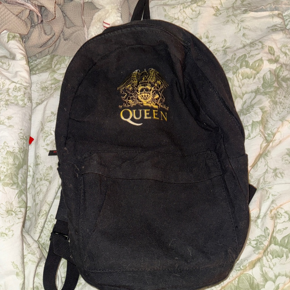 Que Black and Gold Backpack